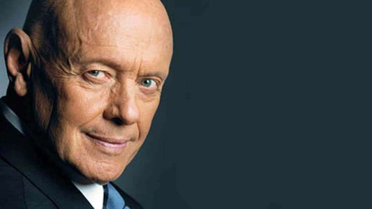 Smiling bald older man representing Stephen Covey’s principle-centered approach in highly effective people Smiling bald older man representing Stephen Covey’s principle-centered approach in highly effective people