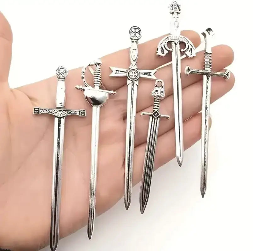 Silver sword pendants with antique silver finish for stylish metal sword bookmarks Silver sword pendants with antique silver finish for stylish metal sword bookmarks
