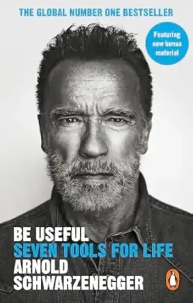 Black and white Arnold Schwarzenegger book cover with Penguin logo Black and white Arnold Schwarzenegger book cover with Penguin logo