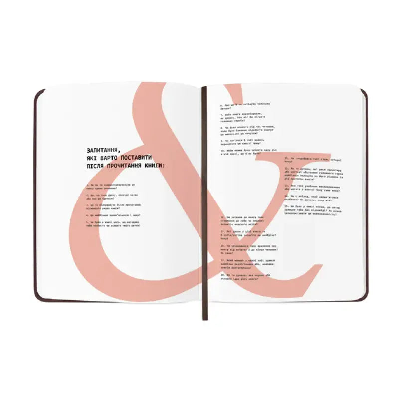 Open notebook with questions for book lovers in the Book Lovers Club Reading Journal Open notebook with questions for book lovers in the Book Lovers Club Reading Journal