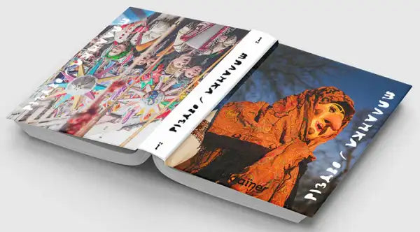 Open books with colorful covers from Bohdan Logvinenko Ukrainian edition celebrating Ukrainian winter Open books with colorful covers from Bohdan Logvinenko Ukrainian edition celebrating Ukrainian winter