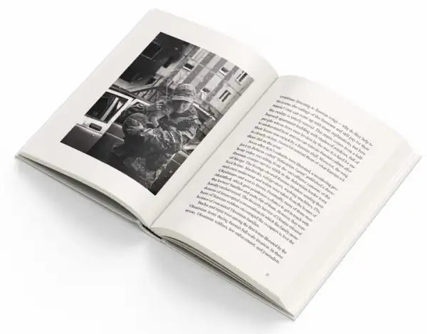 Open paperback book De-occupied Ukrainian Resistance by Bohdan Logvinenko Ukrainian Edition Open paperback book De-occupied Ukrainian Resistance by Bohdan Logvinenko Ukrainian Edition