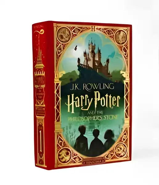 Ornate red-bound Harry Potter and the Philosopher’s Stone MinaLima Edition book Ornate red-bound Harry Potter and the Philosopher’s Stone MinaLima Edition book