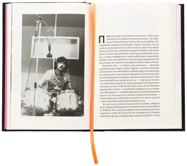Open book featuring a black and white photo of Pink Floyd’s Nick Mason musician Open book featuring a black and white photo of Pink Floyd’s Nick Mason musician