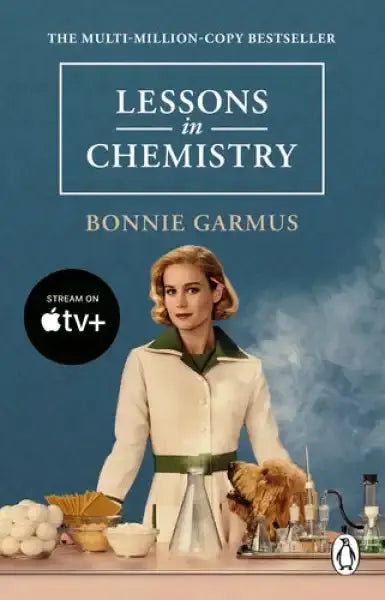 Book cover for Lessons in Chemistry by Bonnie Garmus tie-in paperback with woman in lab coat Book cover for Lessons in Chemistry by Bonnie Garmus tie-in paperback with woman in lab coat