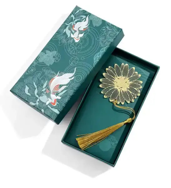 Green gift box with gold flower tassel bookmark and tassel bookmark, elegant brass floral design Green gift box with gold flower tassel bookmark and tassel bookmark, elegant brass floral design