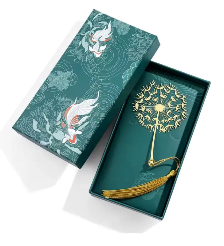 Green gift box with a dandelion flower tassel bookmark for elegant floral decor Green gift box with a dandelion flower tassel bookmark for elegant floral decor