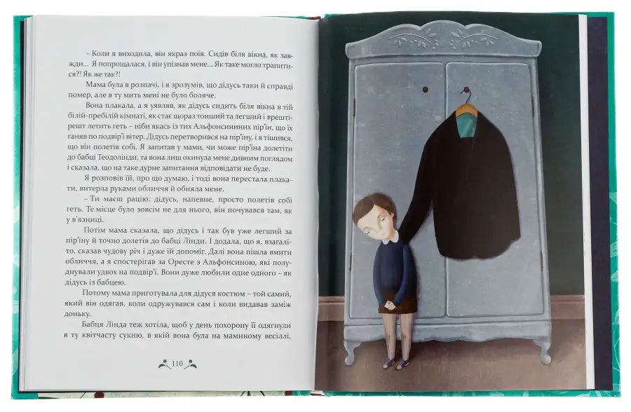 Open book with illustration.