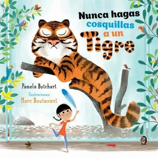 Orange tiger plush toy from Nunca Hagas Cosquillas a un Tigre book Orange tiger plush toy from Nunca Hagas Cosquillas a un Tigre book