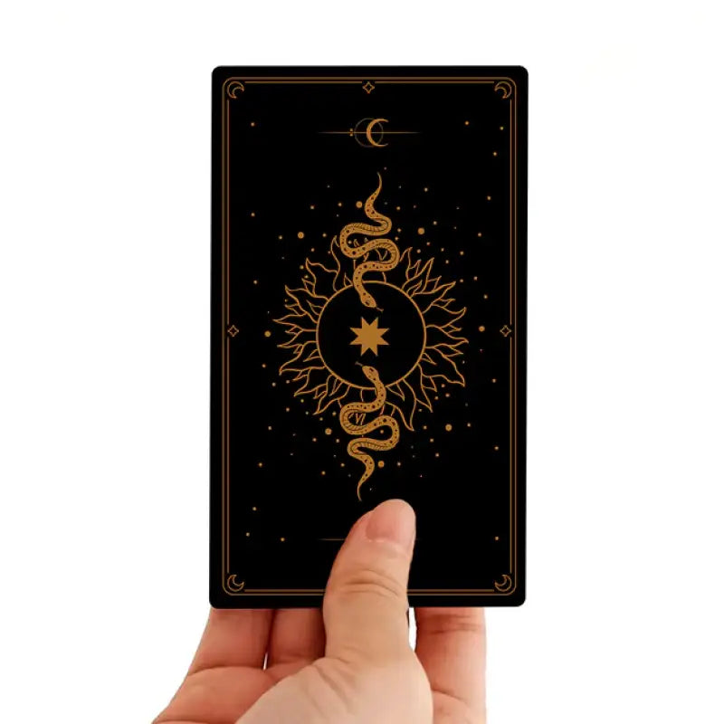 Black and gold tarot card from Teaching Tarot Cards Rider-Waite Ukrainian Edition Black and gold tarot card from Teaching Tarot Cards Rider-Waite Ukrainian Edition