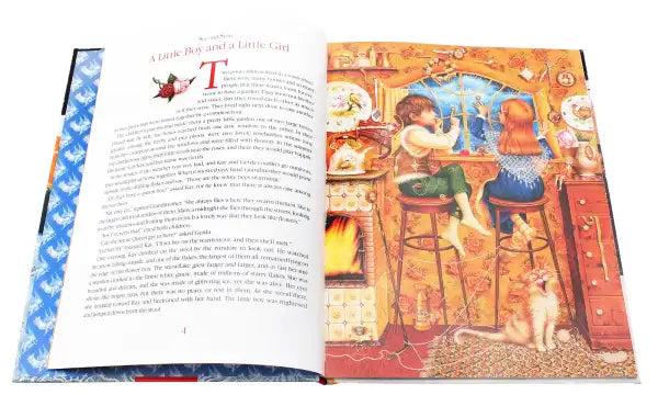 Open children’s storybook featuring Snow Queen illustration from Hans Christian Andersen Open children’s storybook featuring Snow Queen illustration from Hans Christian Andersen