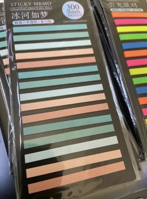 Colorful transparent sticky tabs in pastel shades for organizing books and notes Colorful transparent sticky tabs in pastel shades for organizing books and notes
