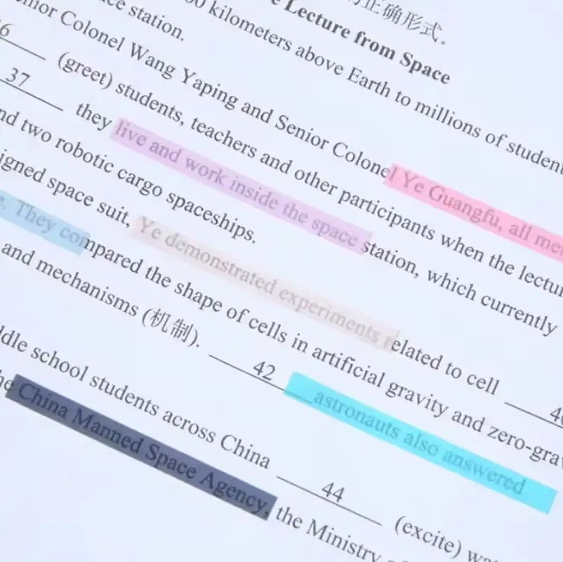 Highlighted worksheet using colorful transparent sticky tabs for organized notes Highlighted worksheet using colorful transparent sticky tabs for organized notes