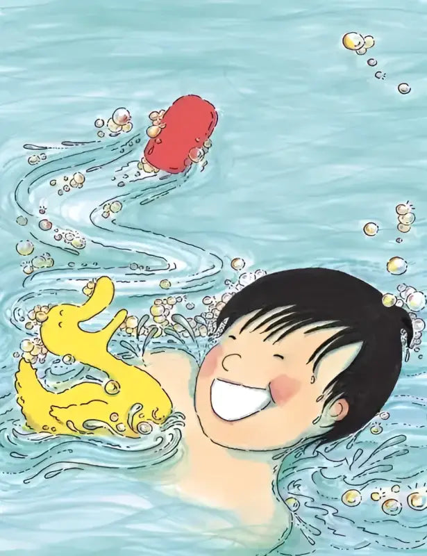 Curious young boy smiling in bubbly bath from Why The Best Book of Questions and Answers