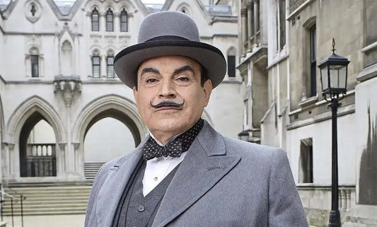 Dapper detective in bowler hat representing Hercule Poirot, Agatha Christie’s legendary detective