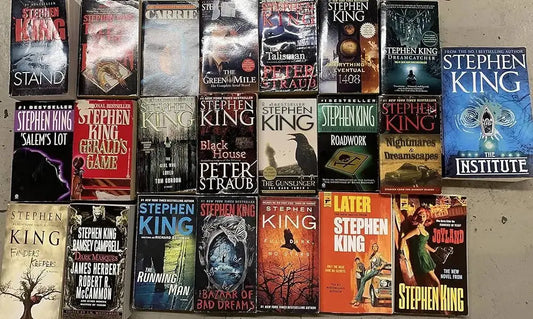 Collection of Stephen King novels showcasing his best books for beginners