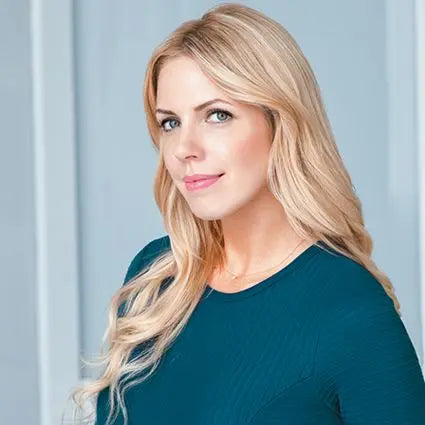 Blonde woman in teal top from Sarah Jio books collection, English books fashion style