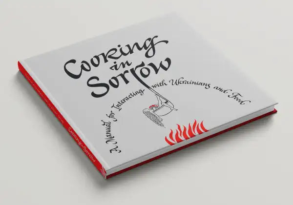 White hardcover book Cooking in Sorrow on Ukrainian culture