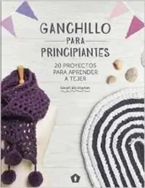 Purple crocheted scarf with pom-poms from Ganchillo para Principiantes