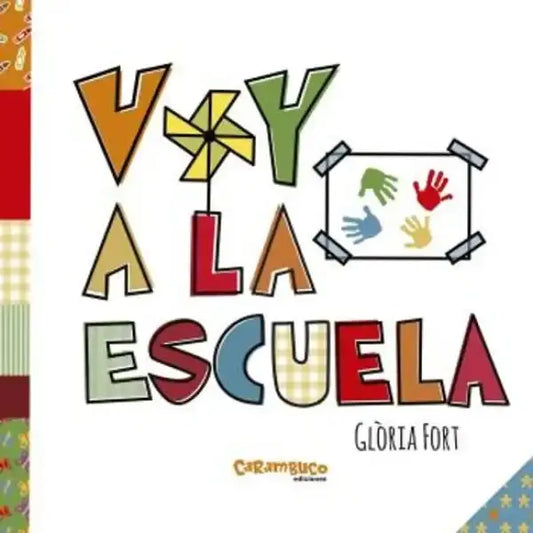 Gloria Fort Spanish board book cover: Voy a la escuela with colorful handprints