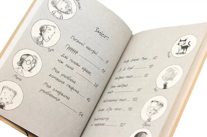 Open book with illustrations and text.