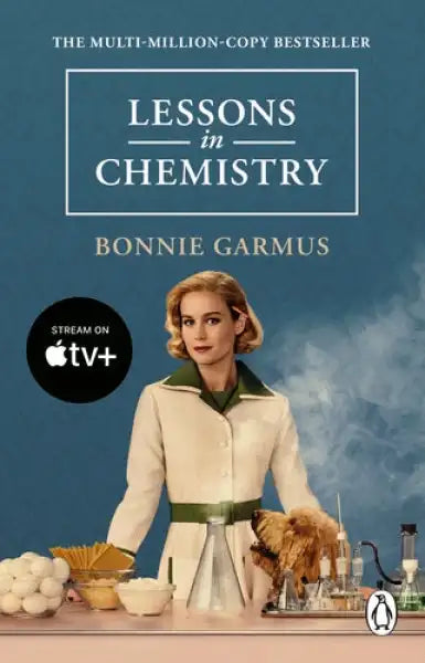 Book cover for Lessons in Chemistry by Bonnie Garmus tie-in paperback with woman in lab coat