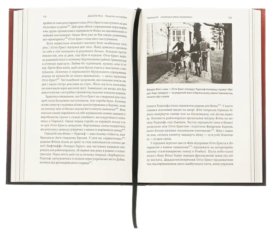 Open book with a black and white photograph.