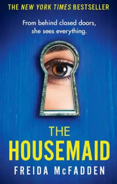 Eye peering through keyhole in Freida McFadden Housemaid thriller book