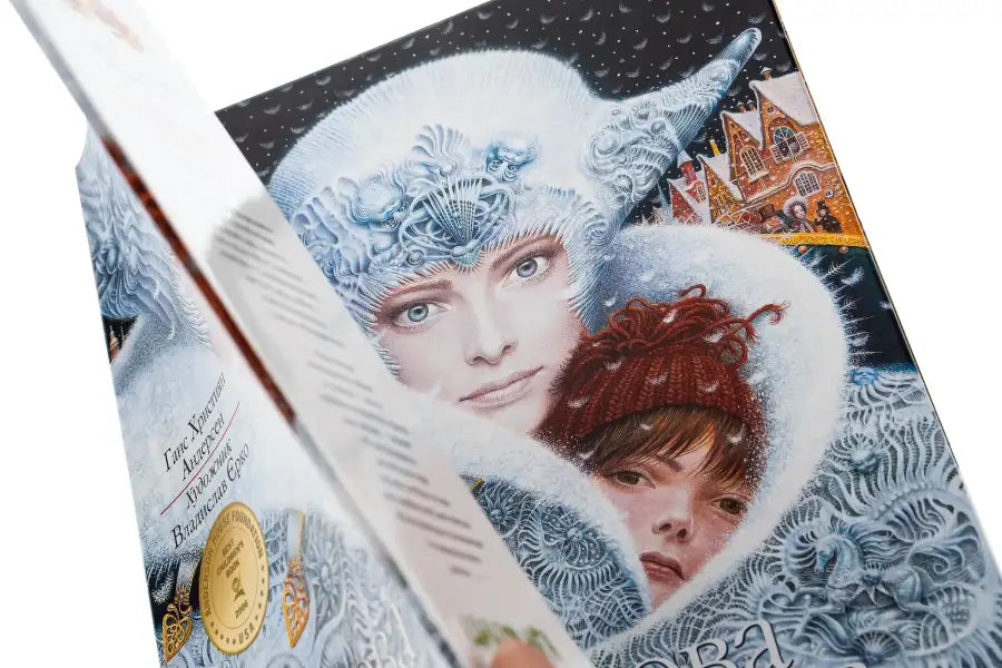 Book cover with wintery illustration of the Snow Queen by Hans Christian Andersen