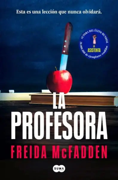 Red apple with knife in psychological thriller book The Teacher by Freida McFadden