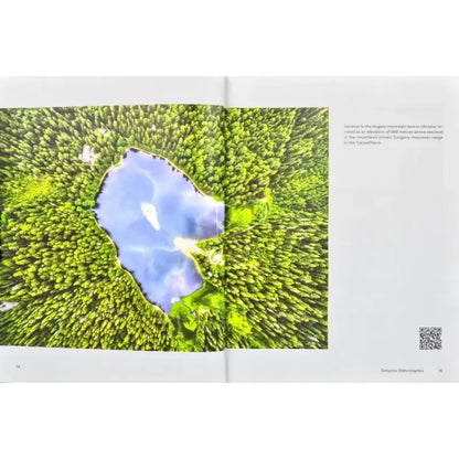Open book with aerial lake view from Ukrainian Insider Bohdan Logvinenko English Edition