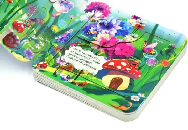 Unicorns Look Inside board book with whimsical garden scene